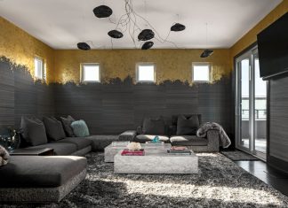 Bold Bronze Touches Bring the Glamour in St. Petersburg Interior designer Rob Bowen combined several rooms to create this large lounge that overlooks a rooftop deck. For a year, he says, the room had bare white walls—until inspiration struck and he installed this gold-leafed horsehair wall covering.