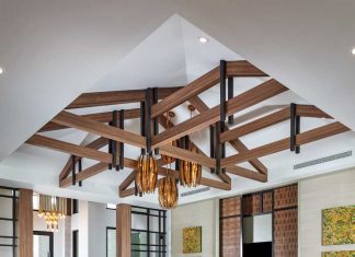 The ceiling pattern in the great room, arguably the home’s most eye-catching feature, is not structural, but simply ornamental. Aside from a Phillips Collection cube table, every furniture piece in this room from the Tommy Bahama Palm Desert collection.