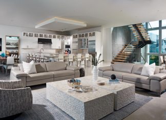 Waterside Modernist Bliss on Bonita Beach A neutral palette of white and gray dominates the residence’s main floor. The design team warmed up the interior with the use of wood.