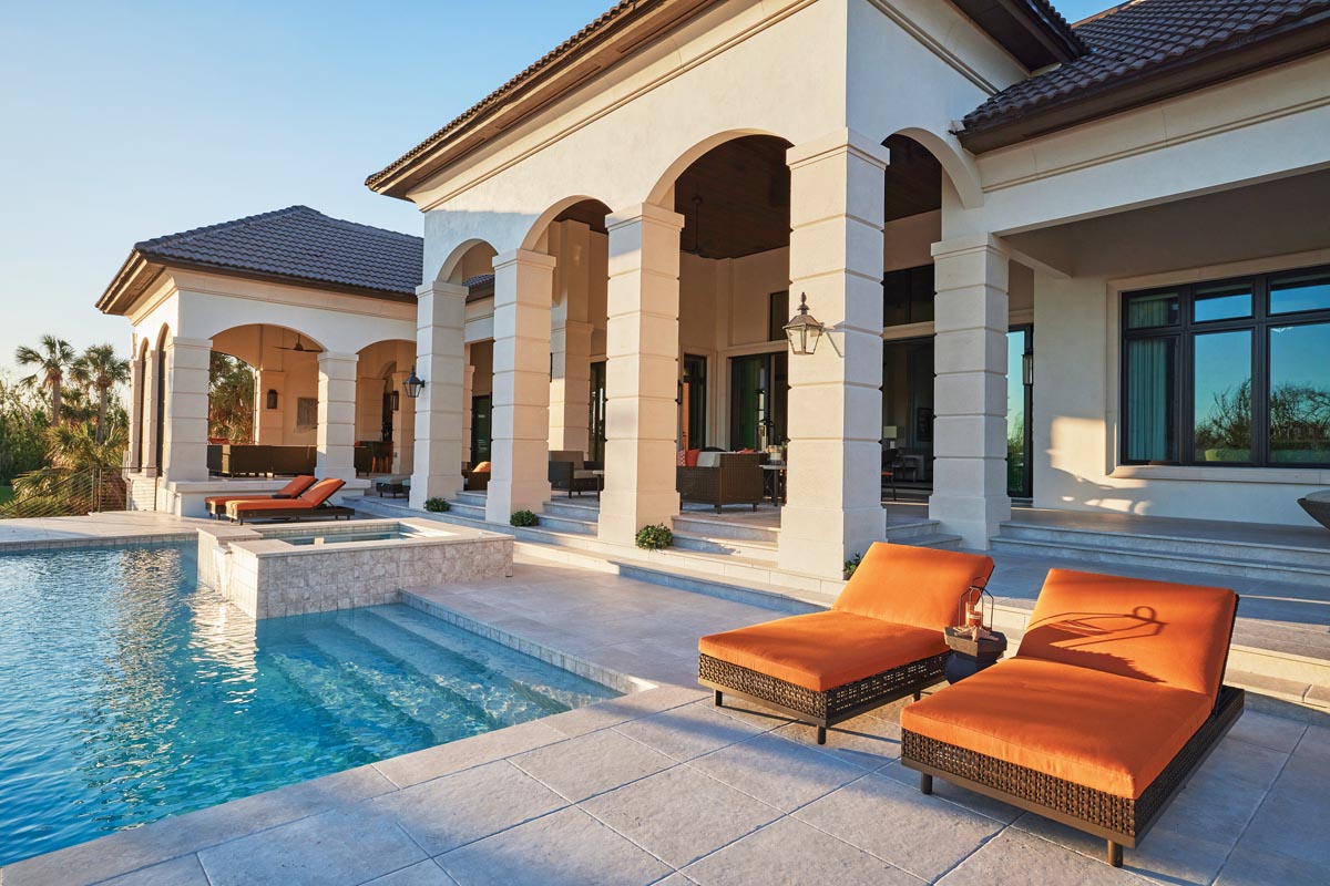 One of the wife&rsquo;s favorite colors is &ldquo;Herm&egrave;s orange,&rdquo; so designers Dwayne Bergmann and Robin McGarry ensured the hue was prevalent indoors and out.