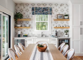 Cozy Charm in Renovated St. Petersburg Bungalow A micro-mosaic tile pattern was chosen for the wall behind the bar. The woven chairs from Serena & Lily echo the texture the tiles bring to that corner of the space. The windows were designed with a mullion pattern that matches the original windows in the home.