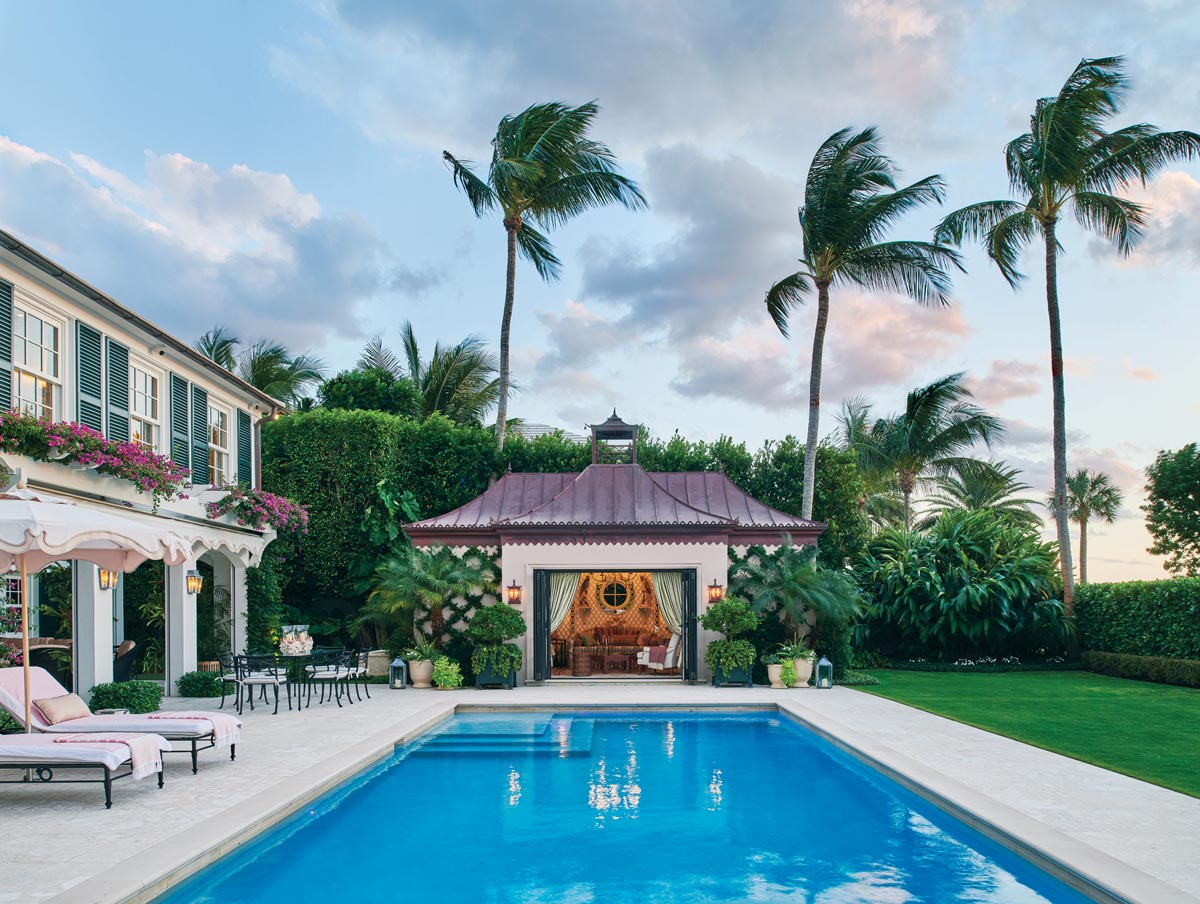 Designer Jessica Lagrange channeled vintage Florida when updating her historic Colonial Revival home in Palm Beach. The backyard&rsquo;s streamlined pool is the perfect foil for a pink stucco pagoda-style cabana.