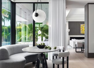 Modern Mashup Stuns in Boca Raton Home “The elliptical, boomerang-shaped banquet across from the kitchen is one of my favorite pieces in the space,” says Charette. “It’s petite but beautiful.”