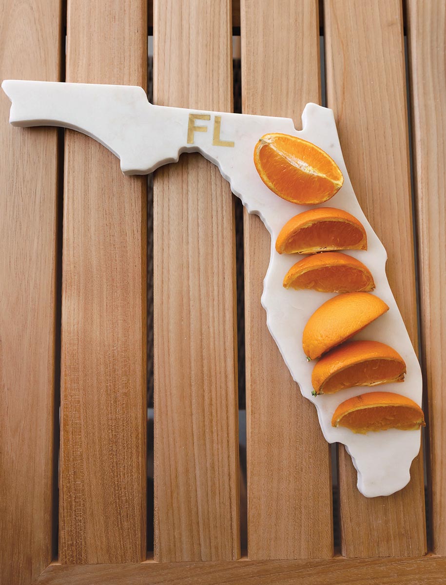 The Florida cutting board is ideal for orange slices or any other type of snack. Photo courtesy of Adelyn Charles Collection