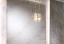 Bianco Lasa/Covelano Vena Oro marble from Antolini is prized for its pristine white base, crystalline texture, and striking honey-colored veins