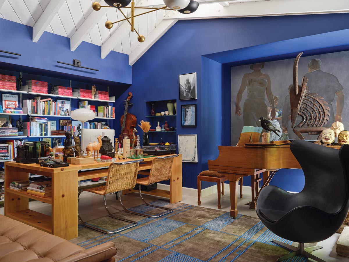 The office certainly fulfills the homeowner&rsquo;s directive for &ldquo;color, color, and more color&rdquo; with a bold shade of blue on the walls that provides an ideal backdrop for the room&rsquo;s vintage furniture.