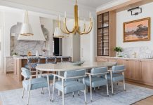 Refined Finesse Defines Ponte Vedra Family Home A focus of the dining room is the wet bar. “The warmth of the white oak, the edge of the steel, and the elegance of the Calacatta marble all come together in an effortless, balanced way,” says Dennis. “One of our favorite details is the custom-shaped backsplash, designed to echo the fluted ceiling above and draw the eye toward the art.”