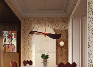 Solid maple Louis side chairs surround the Charlie dining table, all from the Helen Bergin Interiors for Abner Henry Collection