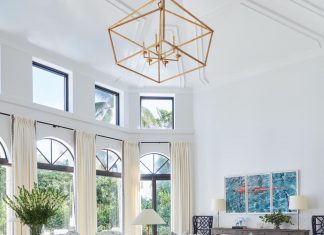Q&A with Designer Ali Frye “The living room sits at the center of the home, directly off the foyer, so we wanted it to set the tone for the design,” says designer Ali Frye. “The room was designed specifically for entertaining, so we painted the ceiling white and installed a show-stopping light fixture by Visual Comfort to draw the eye upward.”