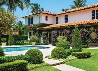 Fernando Wong Designs a Tropical Tapestry Vibrant bougainvillea blooms along the terrace of the Tropical Pool Garden, which includes topiaries of various sizes