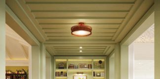 Champalimaud Design was responsible for the Naples Beach Club’s interiors, including the silvery green library section of the lobby.