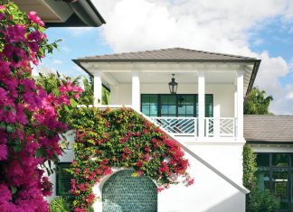 North Palm Beach Retreat is a Gem of Bermudian Design Designed by New York architect David Neff, the Bermudian-style house features an unexpected layout and U-shaped footprint, creating a surprisingly deep backyard. Draped in blossoming bougainvillea, the pool area features Neff’s clever arched built-in seating niche against geometric green tiles from Ceramic Matrix.