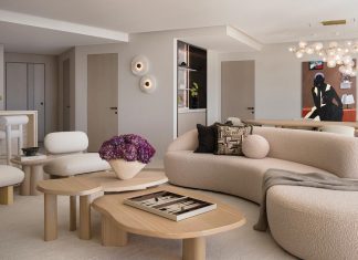 Miami Beach Pied-à-Terre Floats Above Biscayne Bay The design approach in the living room was to create a contemporary yet inviting space layered with softness and a touch of romanticism. The curved forms were intentional to soften the architecture and introduce a sense of fluidity and elegance. “The artwork by Eduardo Rezende immediately resonated with us,” says designer Jessica Jaegger, who helped the homeowners curate the collection in the residence. “It has a quiet, melancholic quality that brings a sense of introspection and calm and enriches the overall ambiance.”