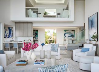 Ethereal Elegance Along the Lake Worth Lagoon The living room showcases Paladino Rudd’s design approach: transitional, timeless, and tasteful. An upper-level seating area connects to the space visually via glass panels.