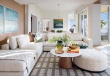 Key Biscayne Condo is a Piece of Paradise The family room is grounded by a rich area rug designed by C2 Concepts Interiors. “The client loves having family over, so the space needed to feel open and comfortable,” says Crispino. “Nothing too formal, just a layout that allows people to gather naturally.” Filled with light, the room centers around an inviting sectional sofa from Four Hands.