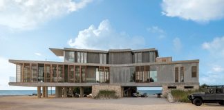 The residence is raised 10 feet off the ground to accommodate storm surge while improving exposure to the southeasterly trade winds. Louvered screens help protect and shade glass exposures while preserving the immersive views. The dwelling embraces natural daylight and cross-ventilation to further connect the occupants to the outdoors.