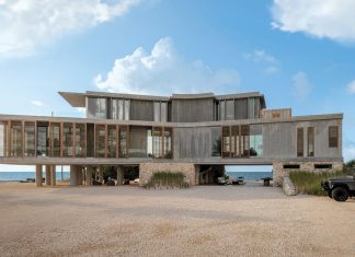 Key Largo Residence is a Climate-Conscious Design Marvel The residence is raised 10 feet off the ground to accommodate storm surge while improving exposure to the southeasterly trade winds. Louvered screens help protect and shade glass exposures while preserving the immersive views. The dwelling embraces natural daylight and cross-ventilation to further connect the occupants to the outdoors.