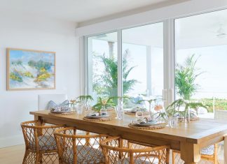 Q&A with Designer Brooke Sabia “This dining room was tricky and narrow as it’s between the kitchen and the deck,” says designer Brooke Sabia. “It is a main area for the family, so we had to ensure that it was not just beautiful but practical as well. The chairs are vintage with custom cushions, and the dining table was custom-made in Maine.”
