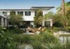 Sunset Islands Backyard Brings Resort Living Home A verdantly landscaped courtyard offers one of the property’s most distinctive areas, anchored by a sculptural Moróro fire pit surrounded by woven club chairs. The adjacent ping-pong table is ideal for matches when the weather is right.