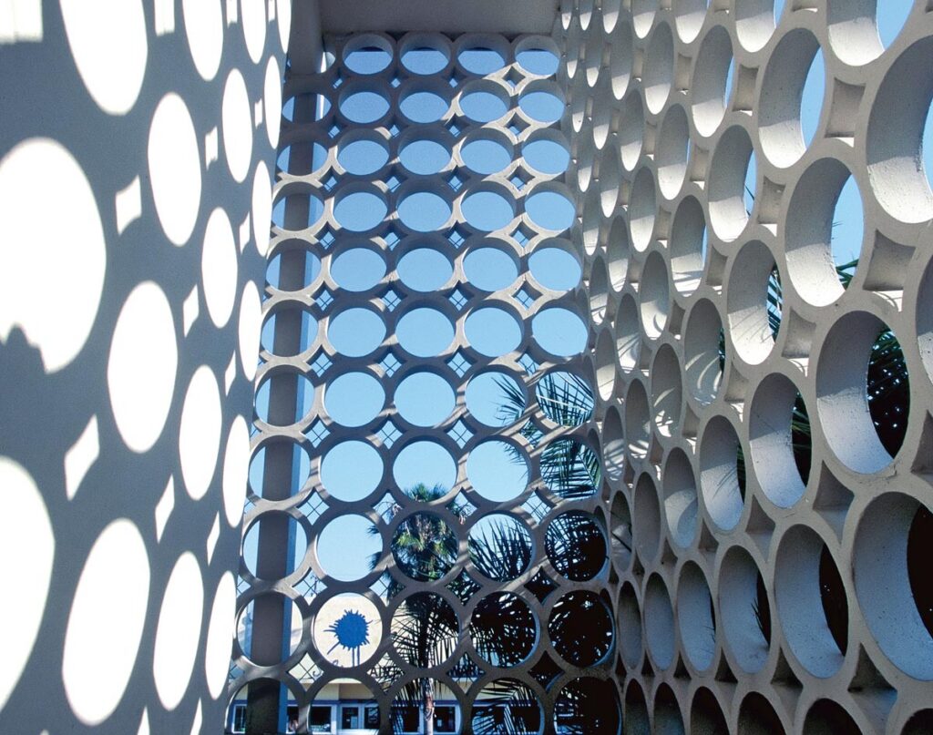 Architect Francis Hoffman’s circular screen-block façade of what was once a branch of Union Planters Bank interacts with light and shadow throughout the day. The building, at 1133 Normandy Drive in Miami Beach, went up in 1958 and now houses several law offices. Photo by Robin Hill