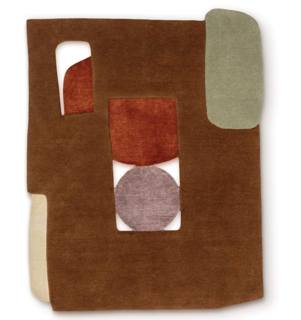 Featuring an abstract cutout pattern and made from New Zealand wool, allo_linen, and Chinese silk, the View area rug by Art + Loom is handmade in Nepal or India using centuries-old techniques