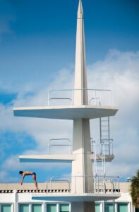 Designed by Robert Law Weed in collaboration with Marion I. Manley, the University of Miami’s diving platform (1966) is true to the MiMo movement as it relies on an unadorned, sculptural use of reinforced concrete, defined by bold geometry, clean lines, and an expressive, functionalist form. Photo by Robin Hill