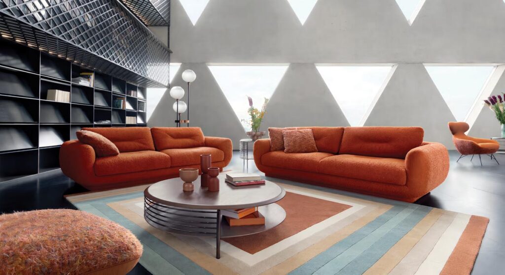 The Intemporel sofa by Maurizio Manzoni for Roche Bobois features modularity that enables the seat to slide forward and transform into a lounge chair