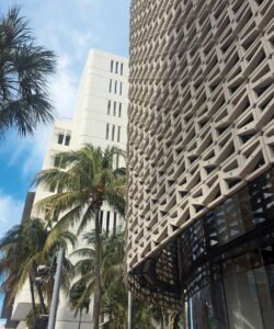 Touzet Studio collaborated with Nike Global to design the brise-soleil (sunscreen) surrounding the Nike store on Lincoln Road in Miami Beach. The typical pattern associated with the brand would have normally been made of gray metal, but Touzet suggested that a high-performance concrete was more in keeping with the MiMo tradition and would meet the guidelines of the Miami Beach Historic Preservation Board. Photo courtesy of Touzet Studio