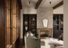 Q&A with Winter Park Designer Ashley Martin The furnishings and materials in the living room create warmth and intimacy while allowing the natural light and sight lines throughout the home to remain the focus. The fireplace surround was fabricated from a precast material with a limestone façade. The Champagne Cobble brick above it was selected for its vintage look. Crafted from oak and finished in a rich stain, the built-in shelves display cherished accessories, books, and mementos.