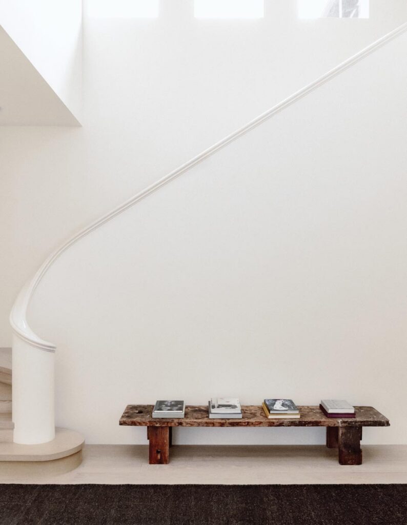 With its strong angles and traditional curves, the elegant staircase of this Coral Gables residence reflects the home’s contemporary interpretation of colonial architecture
