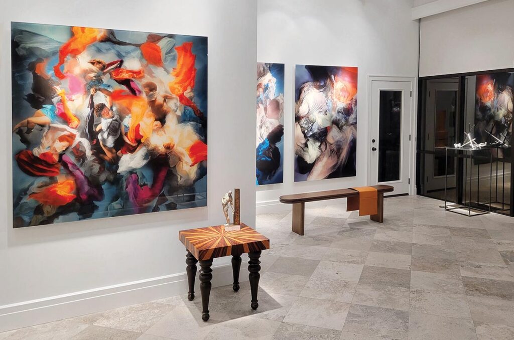 A section of Method & Concept’s exhibition space reveals colorful photography by Christy Lee Rogers as well as the Starburst table and Museum bench