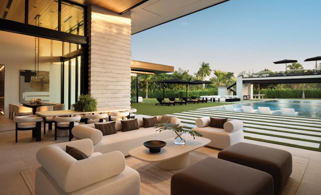 The home’s loggia offers immediate access to the pool courtyard and patio. The design team sourced modern performance weaves for the upholstery of the RH sofas and chairs, ensuring resort-grade durability without sacrificing warmth or elegance.