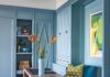 “The office/den was designed to make the most of the ocean view with the desk intentionally positioned to face the water,” says Gaddis. “Custom cabinetry in the same serene teal blue used throughout the home creates continuity.”